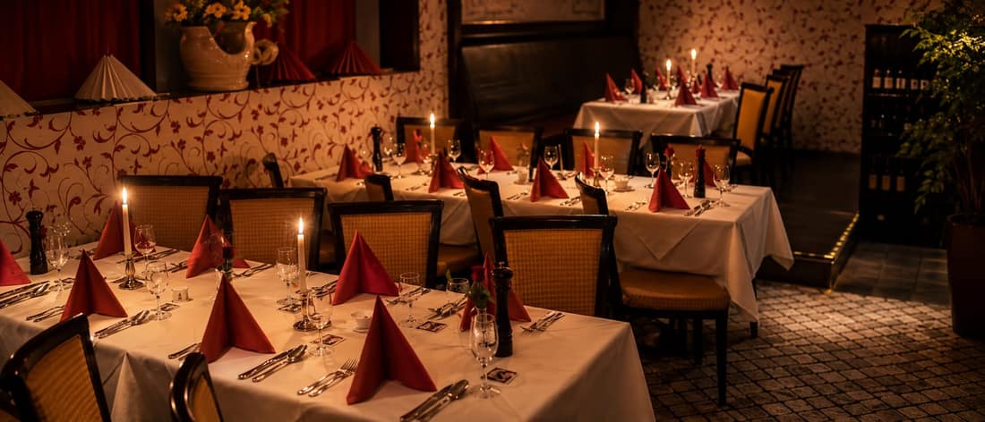 Gastraum des La Dolce Sosta mit eingedeckten Tischen